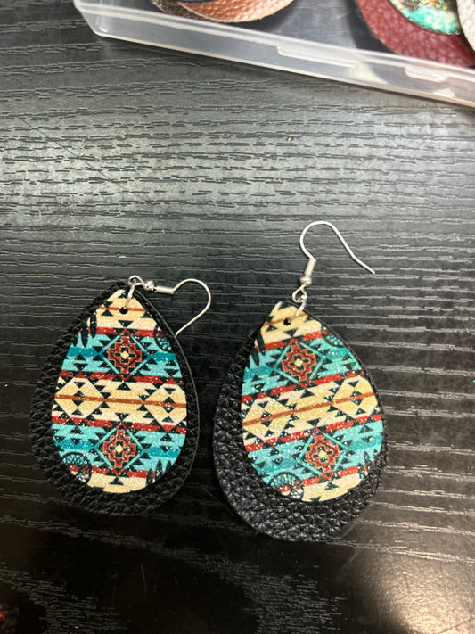 Teal and brown Aztec on black