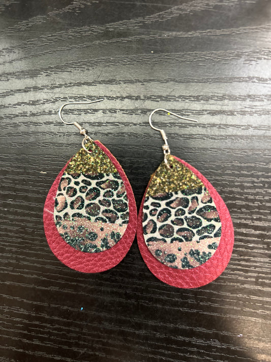 Pink and gold cheetah on burgundy