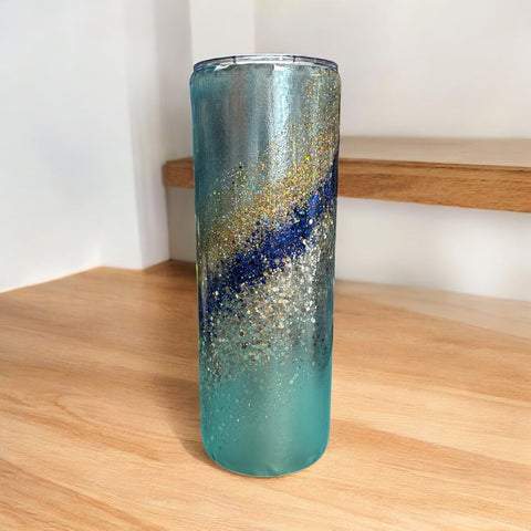 20 oz aqua with blue, gold and silver epoxy tumbler